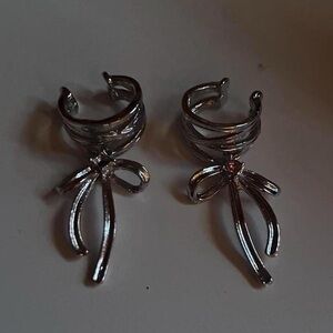 Silver bow ear cuffs